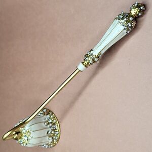 Elegant Gold and Cream Candle Snuffer